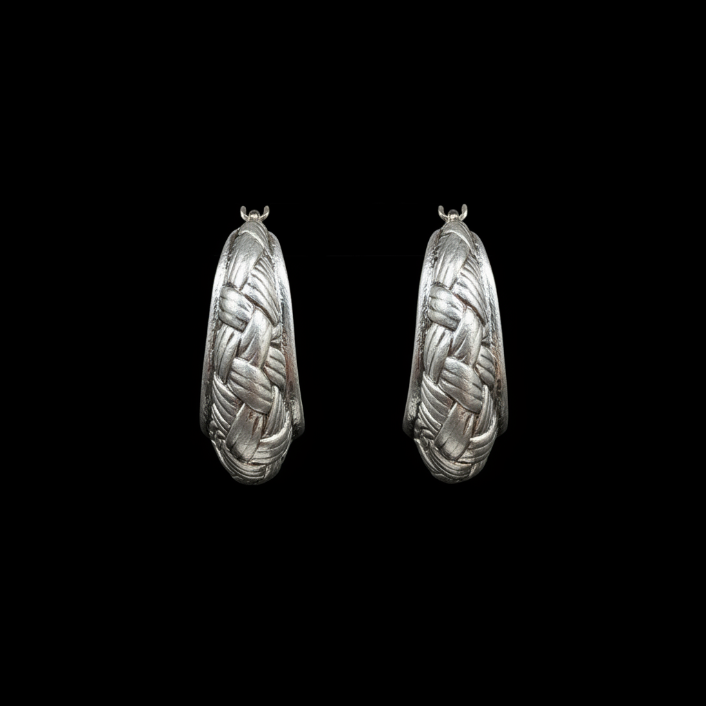 Black background silver woven oval hoop earrings