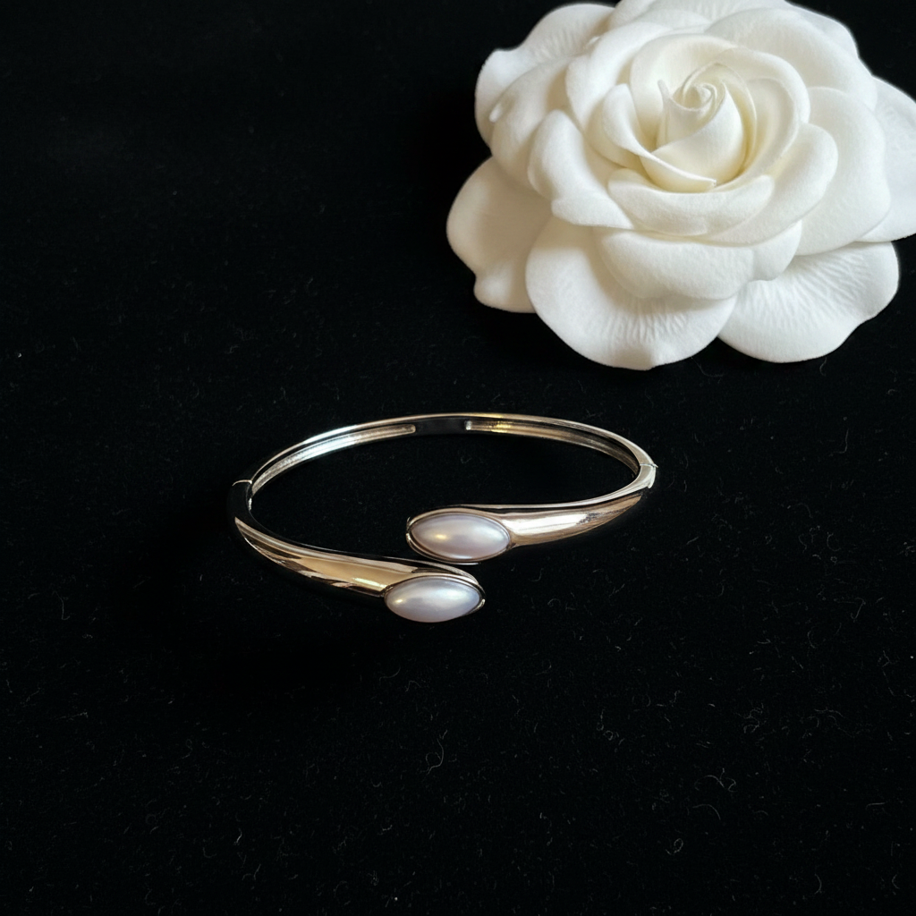Duo pearl silver bypass flat lay
