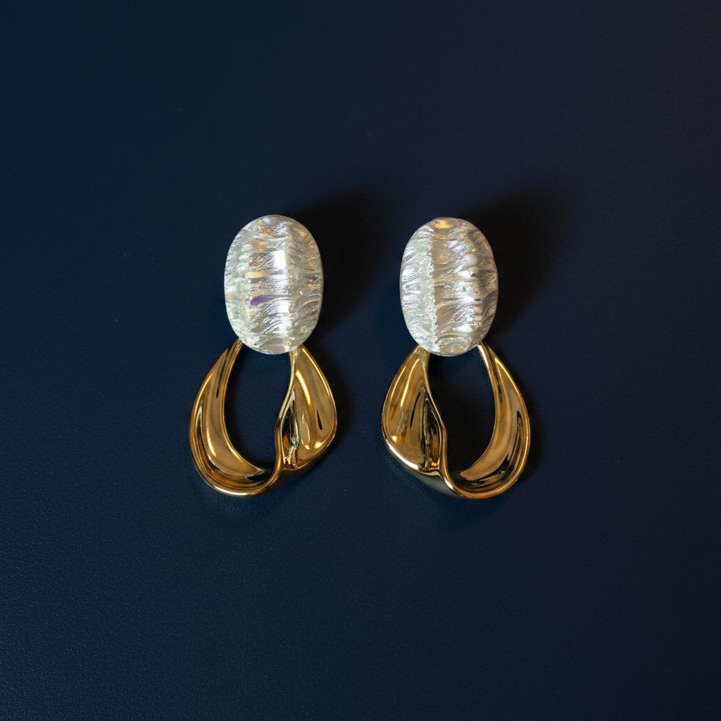 Flat lay crystal gold loop earrings