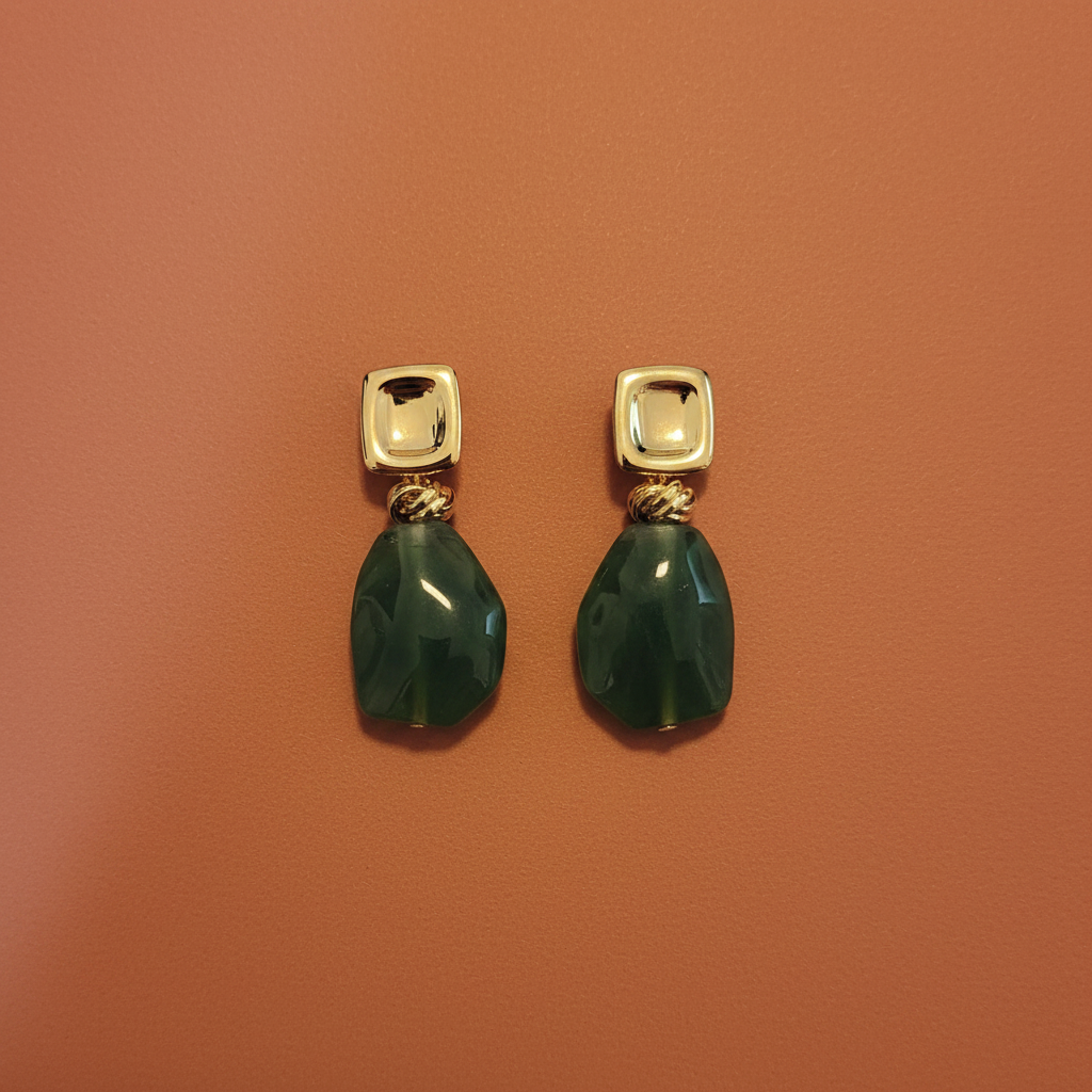 Flat lay green jade drop earrings