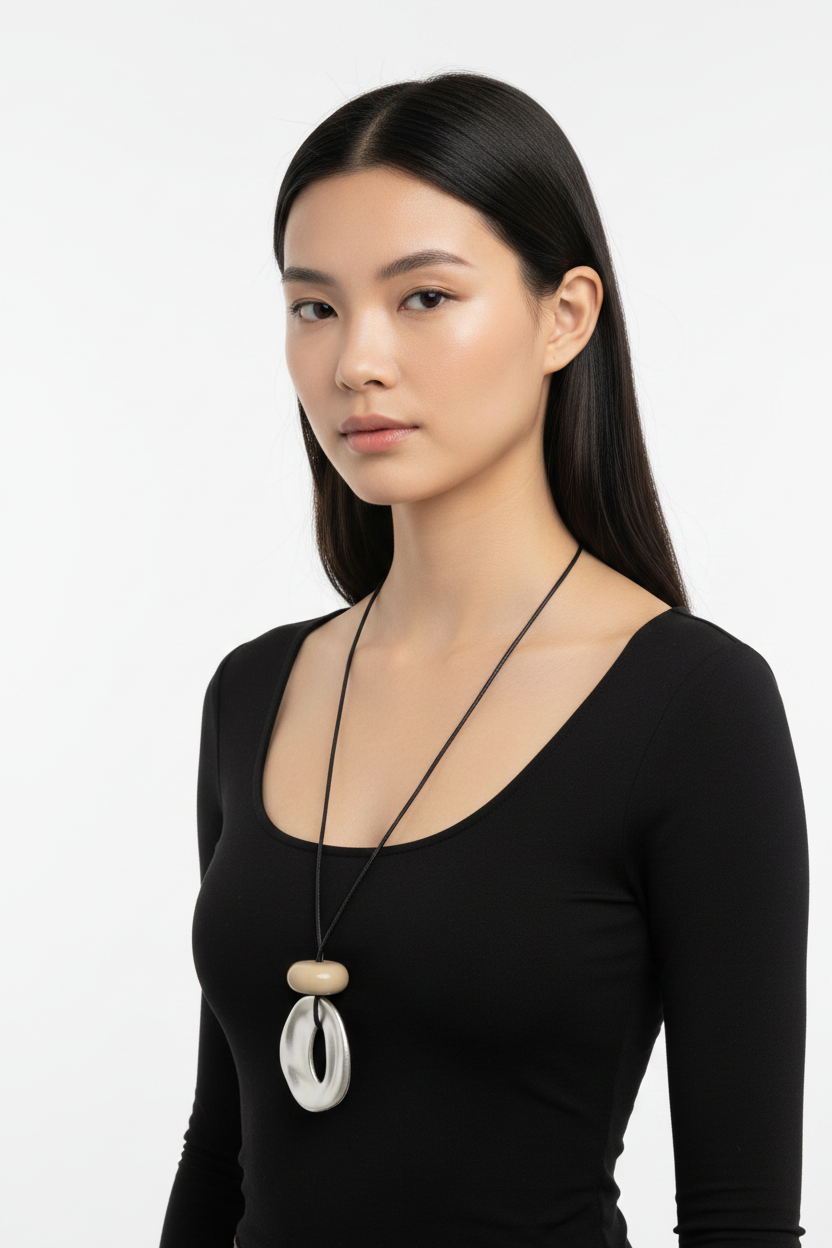 Fresh model shot pearlescent oval pendant black cord necklace