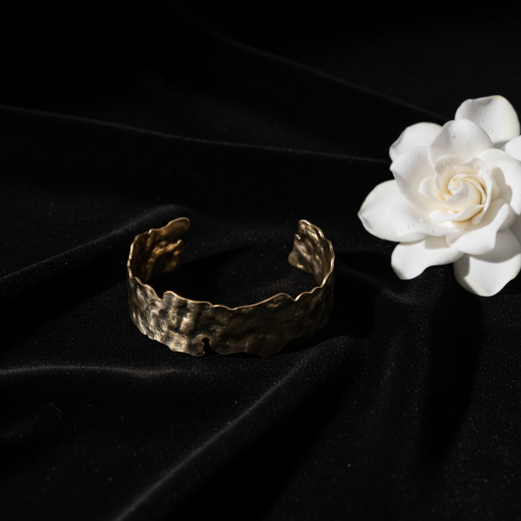 Hammered gold cuff flat lay