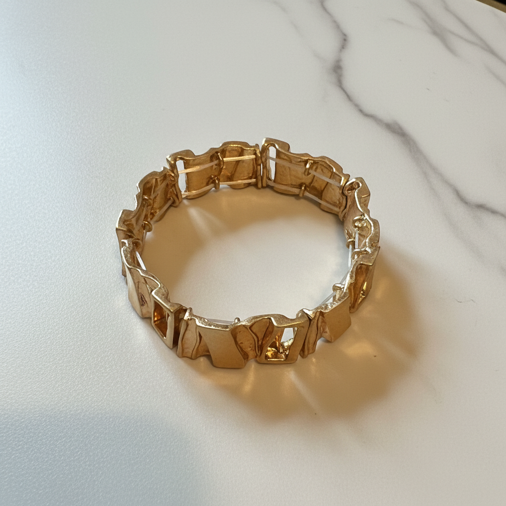 Rocco gold link bracelet flat lay