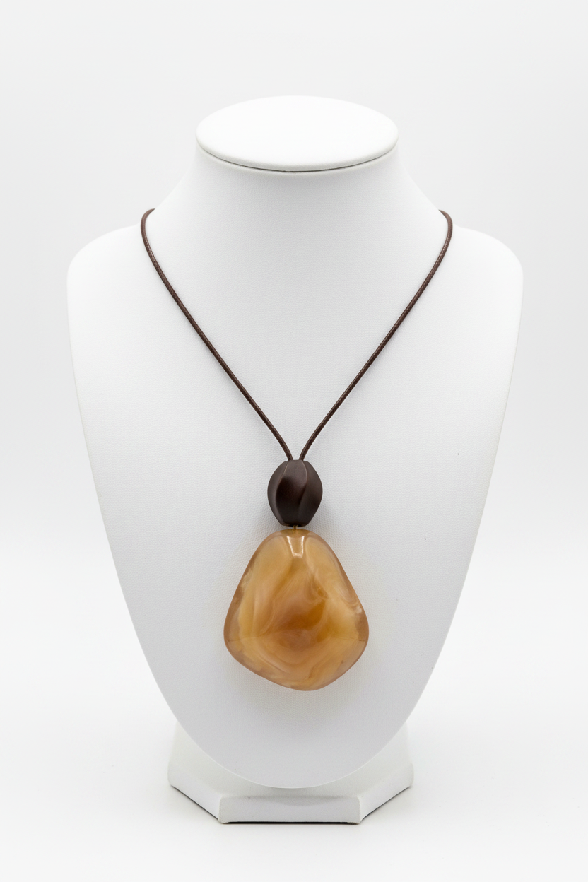 White background honey resin stone pendant dark cord necklace